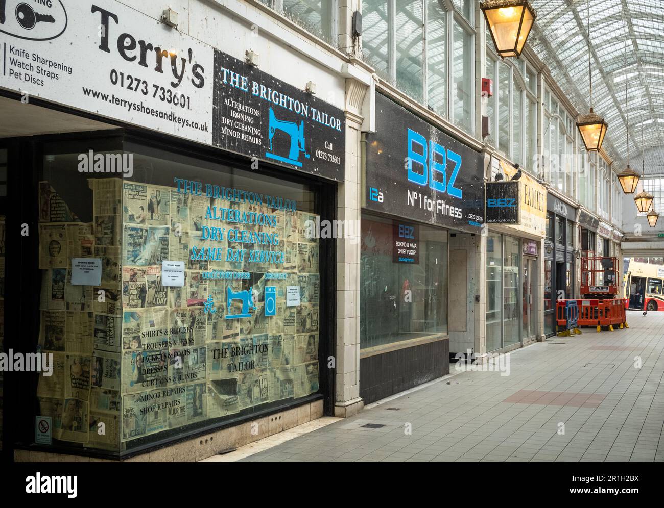 The famous Art Deco style Imperial Arcade in Brighton, UK, lined with empty and abandoned shops. Physical shops businesses suffer from losing business Stock Photo