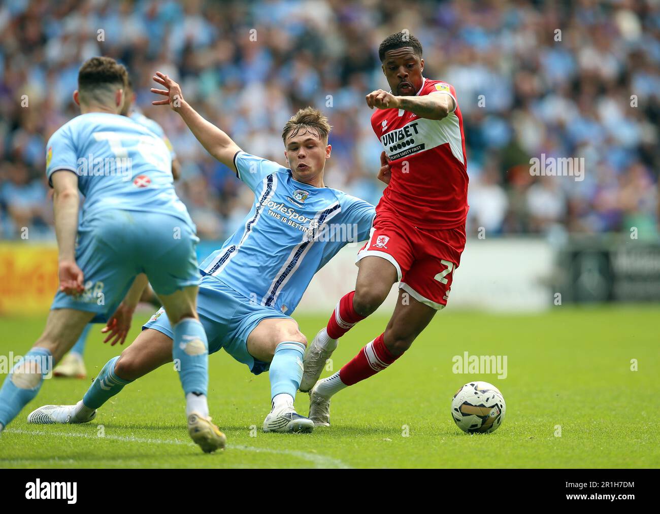Coventry City's Callum Doyle tackles Middlesbrough's Chuba Akpom during the Sky Bet Championship play-off semi-final first leg match at the Coventry Building Society Arena, Coventry. Picture date: Sunday May 14, 2023. Stock Photo