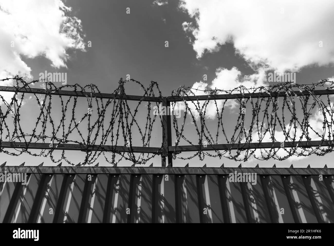 Prison wall with barbed wire. Law. Crime. Jail Stock Photo - Alamy