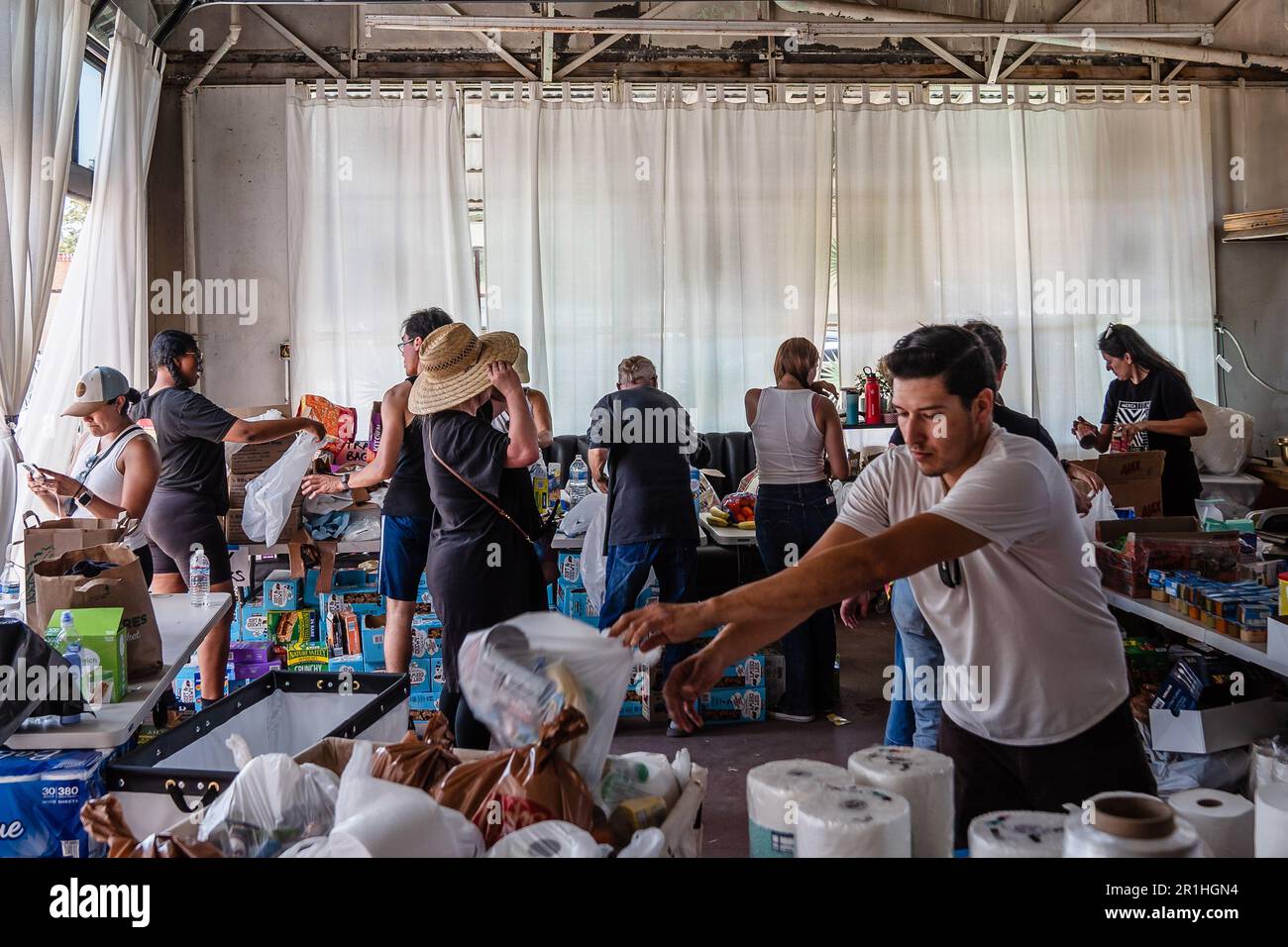 Jacumba, United States. 13th May, 2023. Volunteers gather donations of