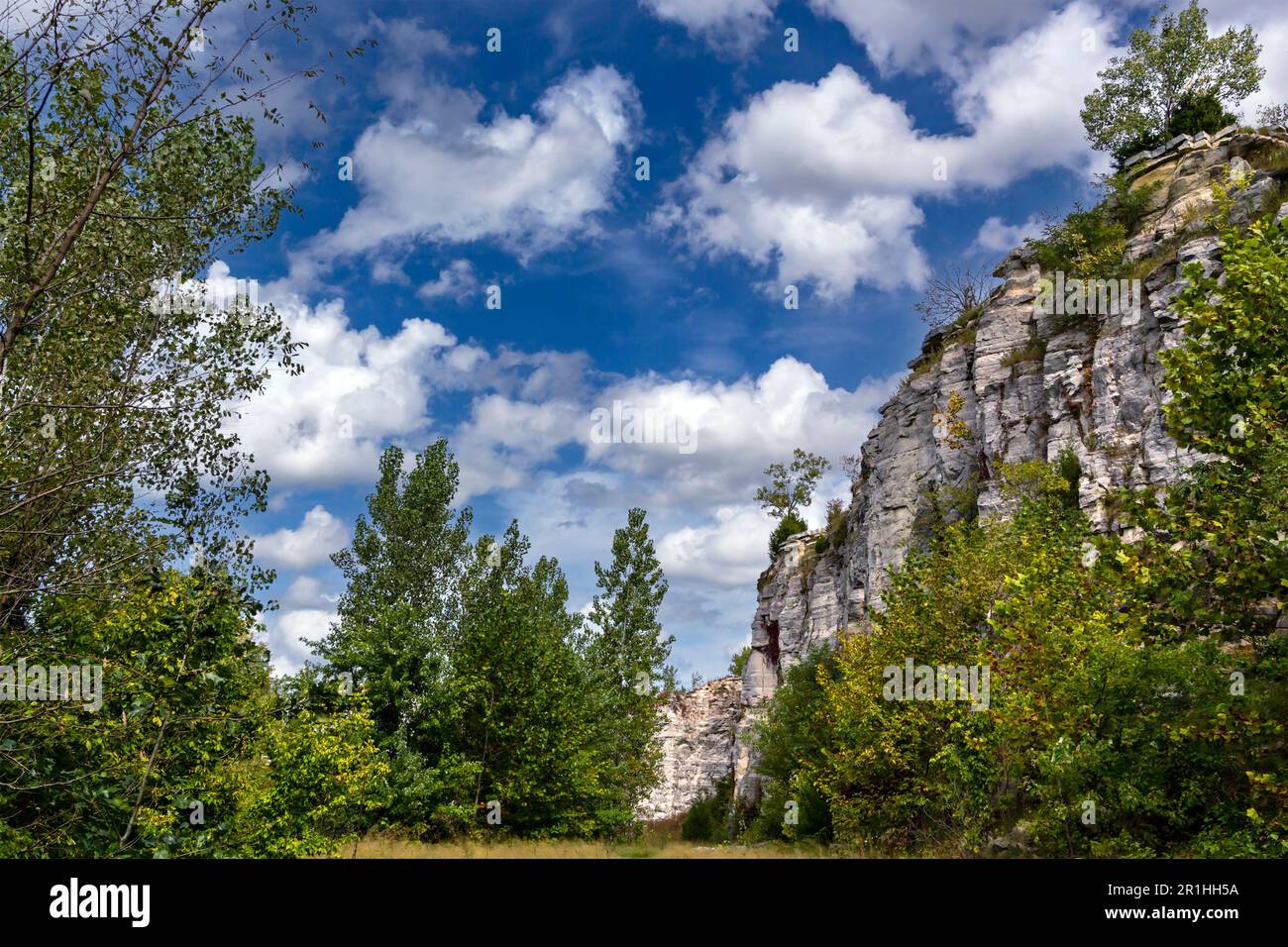 Landscape with cloudy sky and rock bluffs at Klondike Park in St ...