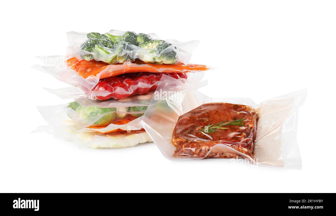 Vacuum packs with different food products on white background Stock