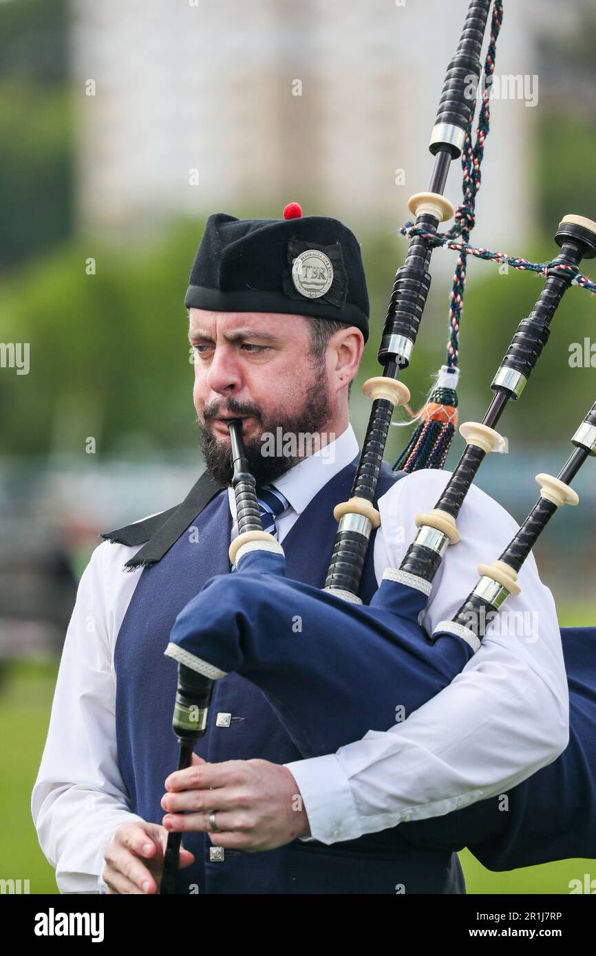 Gourock, UK. 14th May, 2023. The first Highland Games of the 2023 season took place at Battery Park, Gourock, Scotland, when competitors from Scottish Country Dancing, pipe bands and the traditional 'Scottish Highland Heavy' competitions. Piper from Troon Blackrock pipe band. Credit: Findlay/Alamy Live News Stock Photo