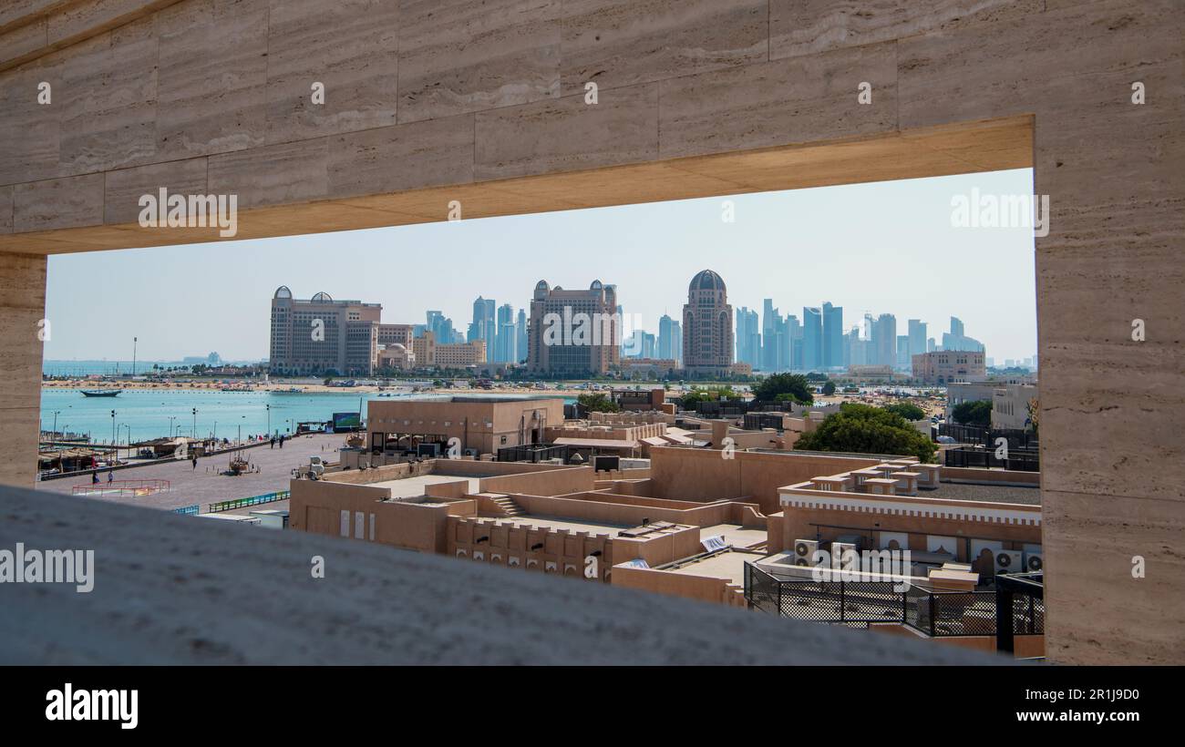 View from the Katara Amphitheater towards West Bay with St. Regis Hotel & Residential Towers in front of the rest of the Doha skyline Stock Photo