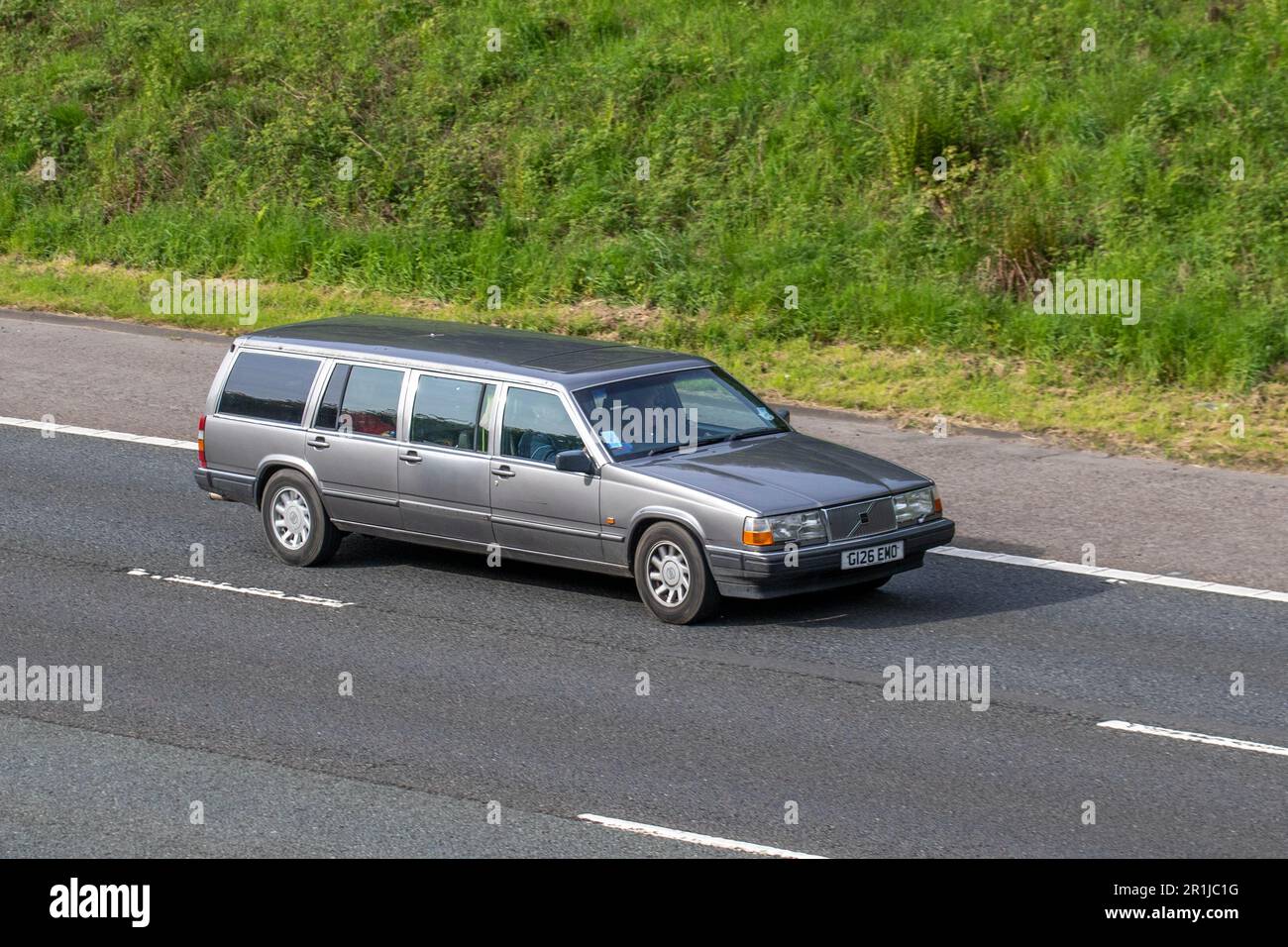 1990 90s nineties stretched Volvo 760 Gle Auto Auto Grey Car Estate Petrol 2849 cc 6-door estate; travelling on the M61 motorway, UK Stock Photo