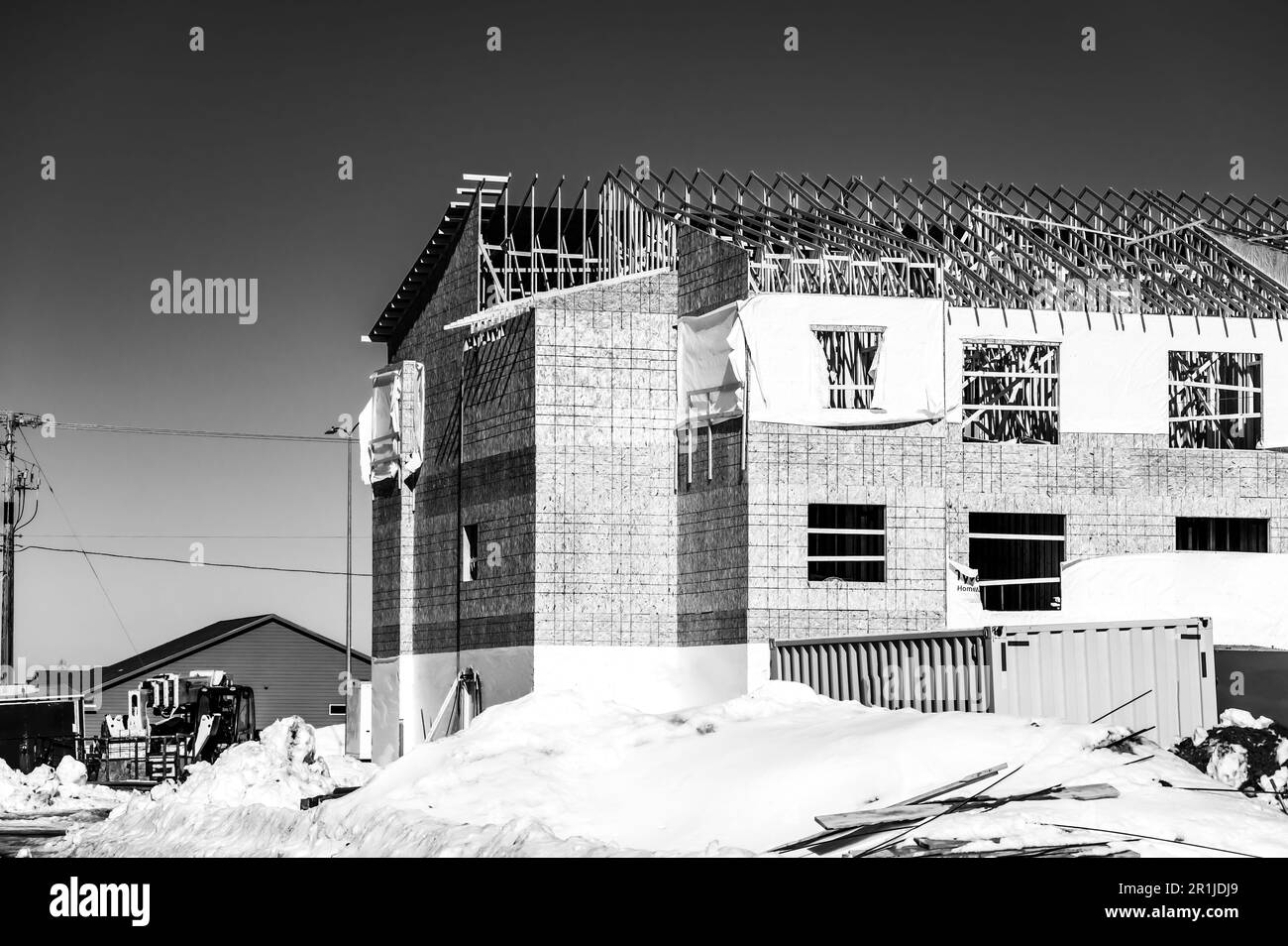 Ground level view of a multifamily apartment complex under construction