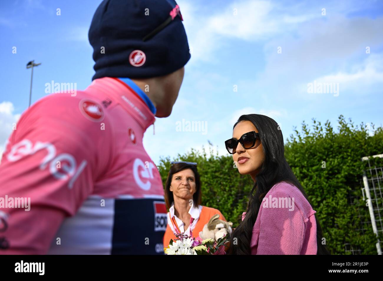 Cesena, Italy. 14th May, 2023. Belgian Remco Evenepoel of Soudal Quick-Step wearing the pink jersey (maglia rosa) of leader in the overall ranking celebrates with his mother Agna Van Eeckhout (C) and his wife Oumaima Oumi Rayane (R) after the stage nine of the 2023 Giro D'Italia cycling race, an individual time trial from Savignano sul Rubicone to Cesena (35km), in Italy, Sunday 14 May 2023. The 2023 Giro takes place from 06 to 28 May 2023. BELGA PHOTO JASPER JACOBS Credit: Belga News Agency/Alamy Live News Stock Photo