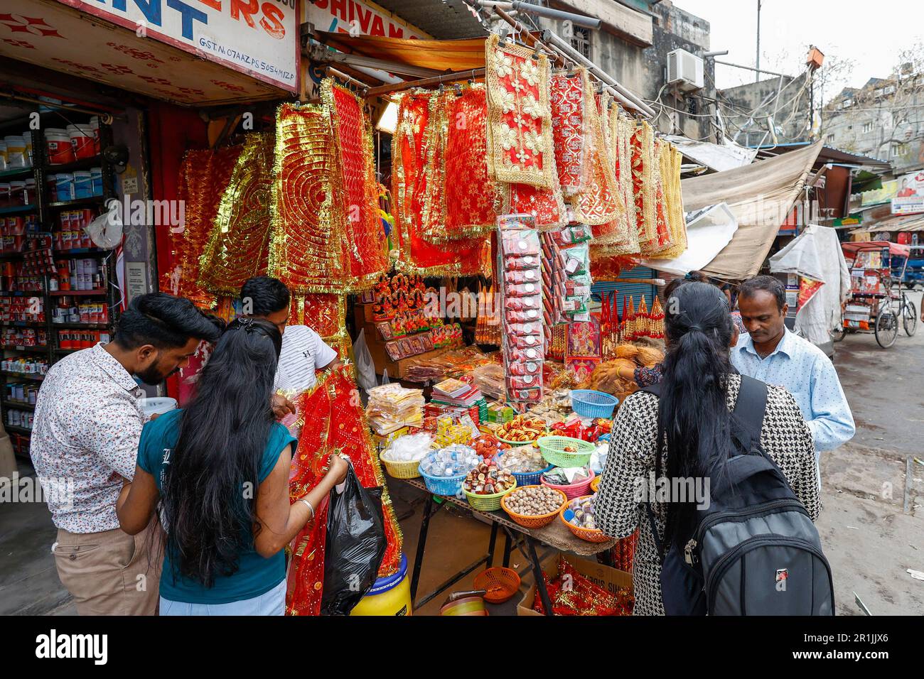 Hindu religious offerings displayed at a street store in Paharganj, New Delhi, India Stock Photo