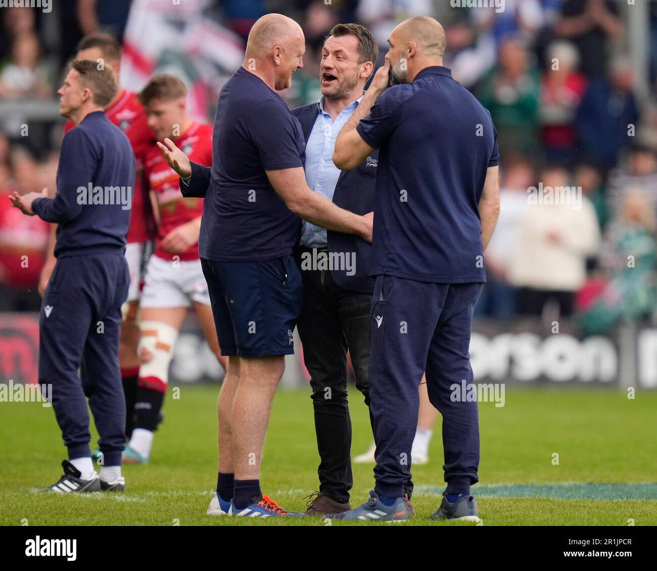 Eccles, UK. 14th May, 2023. Former Sale and England winger Mark Cueto celebrates with coach Pete Anglesea and Alex Sanderson Director of Rugby of Sale Sharks after the Gallagher Premiership Play-Off Semi-Final match Sale Sharks vs Leicester Tigers at AJ Bell Stadium, Eccles, United Kingdom, 14th May 2023 (Photo by Steve Flynn/News Images) in Eccles, United Kingdom on 5/14/2023. (Photo by Steve Flynn/News Images/Sipa USA) Credit: Sipa USA/Alamy Live News Stock Photo