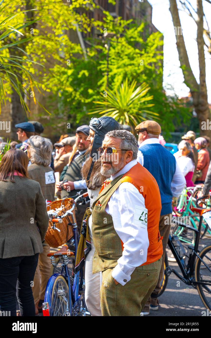 Tweed Run 2023 Bicycle Event - Vintage Dress Up Middle Aged Man in Crowd looking Cool - Vintage bike event Stock Photo