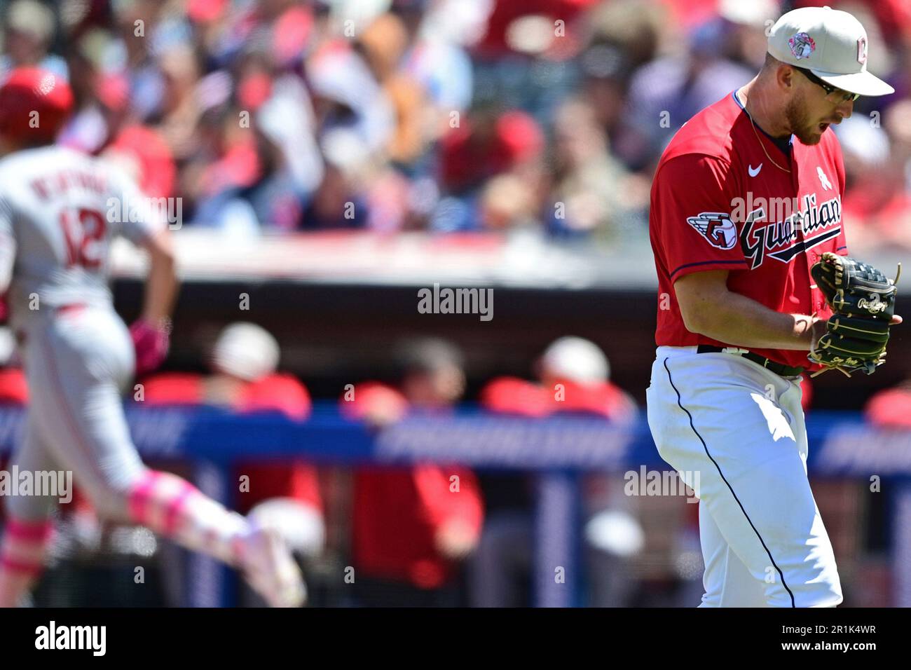 Cleveland Guardians starting pitcher Tanner Bibee reacts while walking
