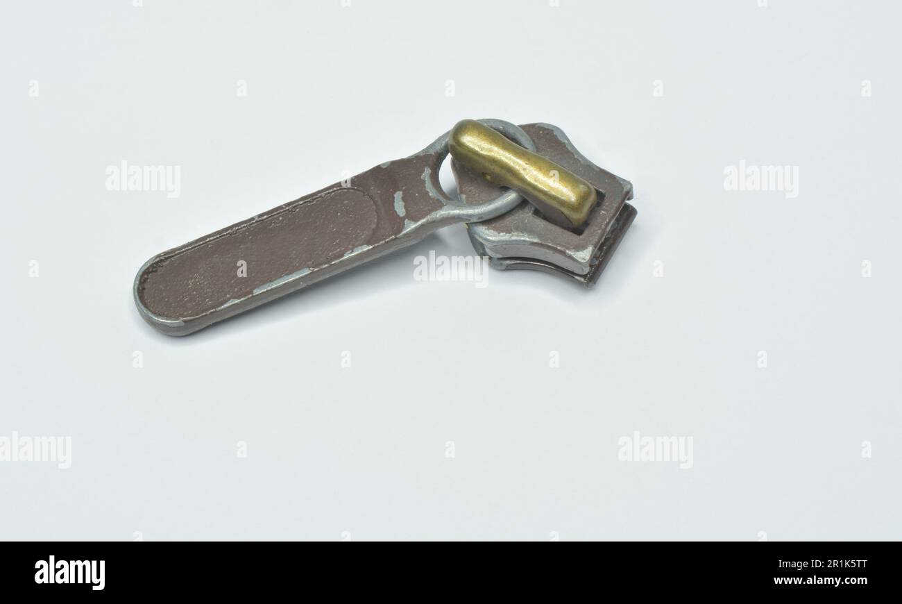 Zip Slider  and Puller isolated on gray background Stock Photo