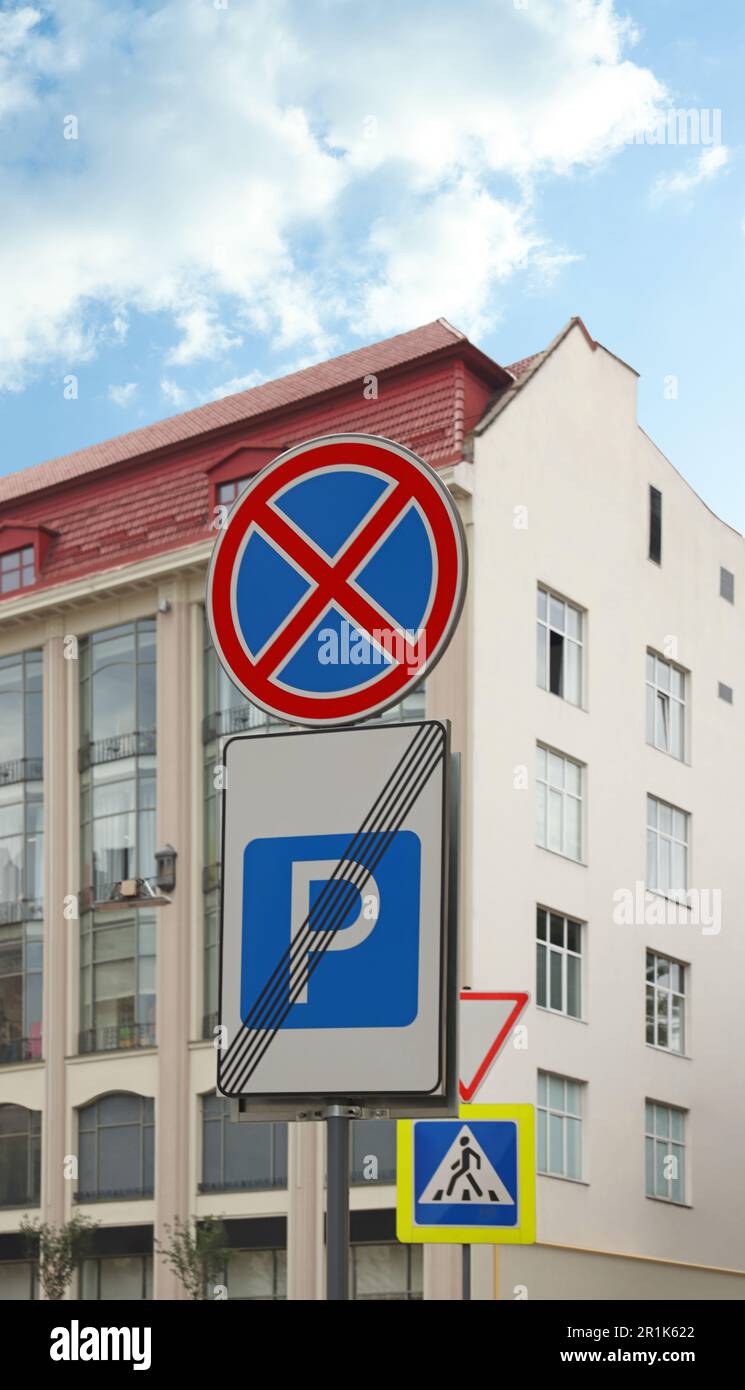 Traffic signs No Stopping and Parking Zone Ends on city street Stock