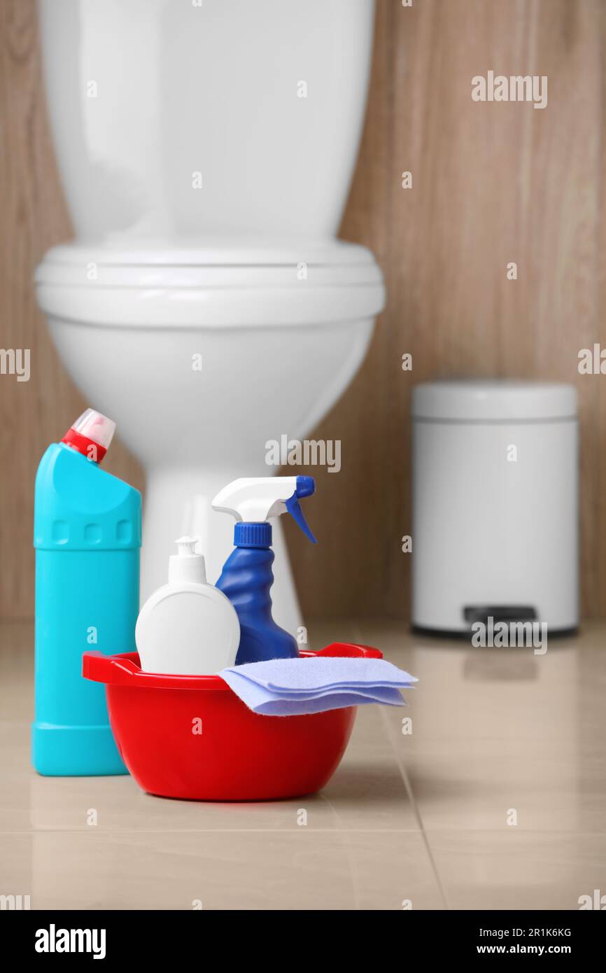 Different toilet cleaning supplies on floor indoors Stock Photo Alamy