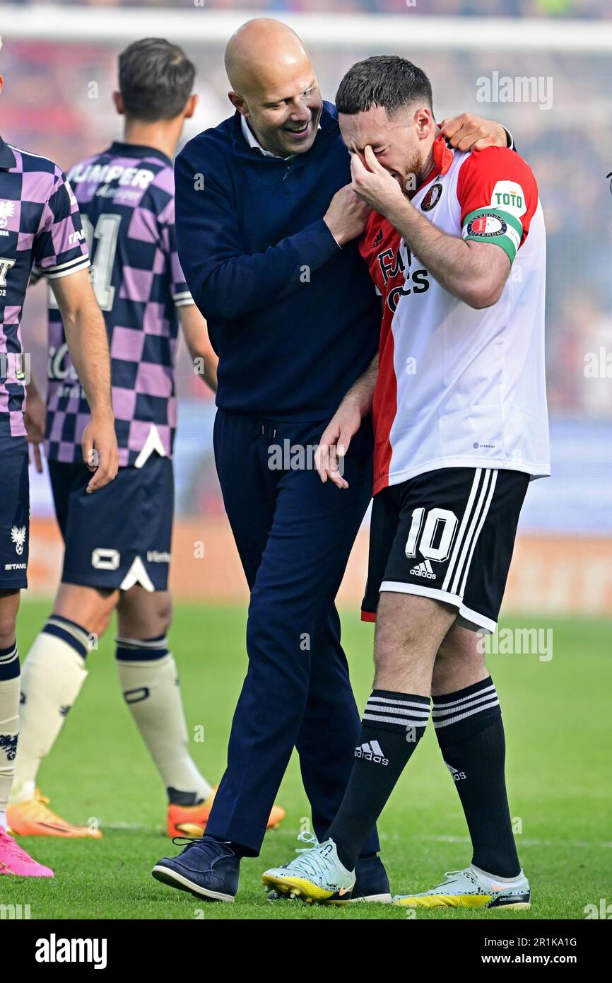 ROTTERDAM - Coach of Feyenoord Arne Slot with Orkun Kokcu after winning the championship against Go Ahead Eagles at Feyenoord Stadion de Kuip on May 14, 2023 in Rotterdam, Netherlands. ANP OLAF KRAAK Stock Photo