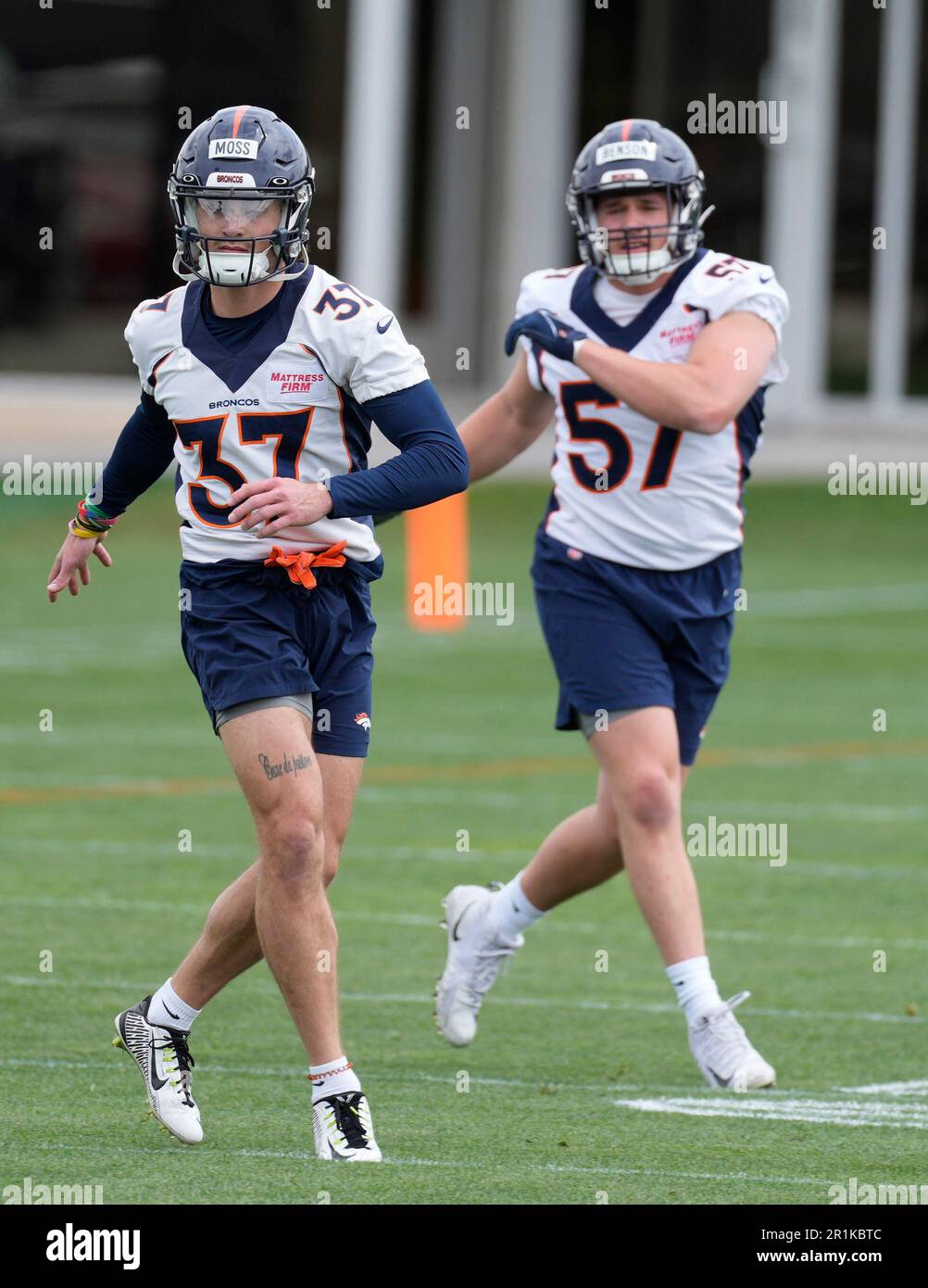 Denver Broncos cornerback Riley Moss takes part in drills during an NFL