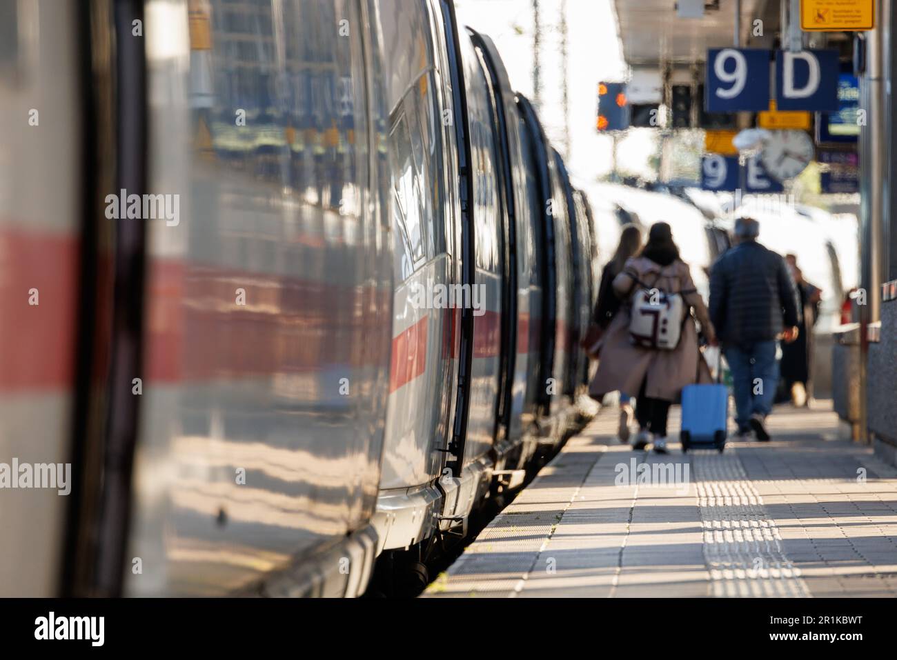 Nuremberg, Germany. 14th May, 2023. Travelers walk with luggage along