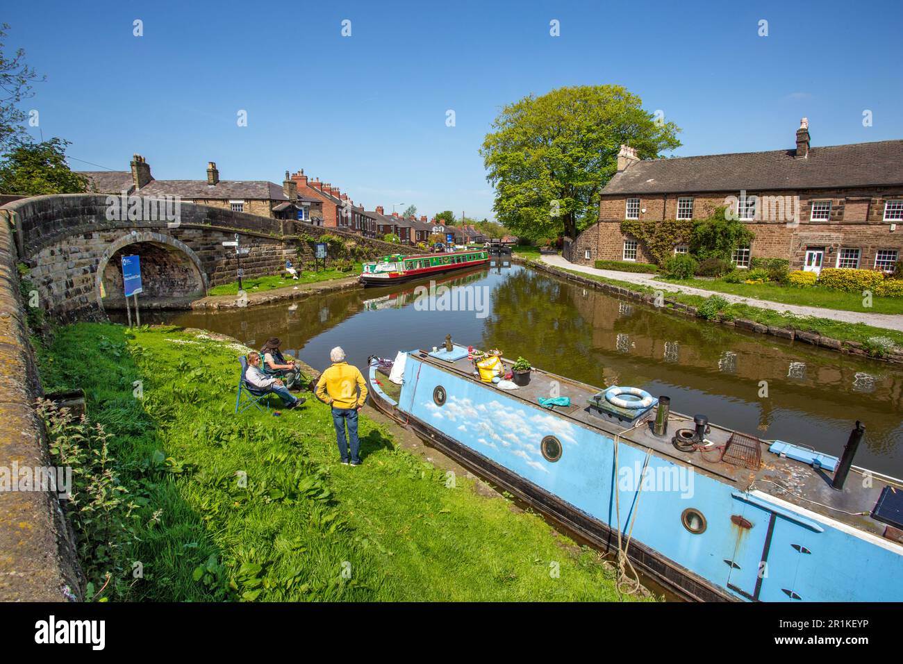 Canal narrowboat moored on the Peak forest canal at its junction with the Macclesfield canal at Marple in Cheshire Stock Photo