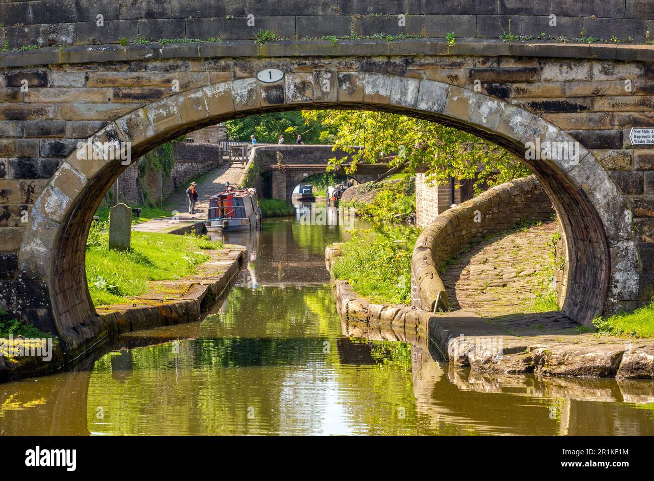 Canal bridge over the Macclesfield canal at its junction with the Peak forest canal at Marple in Greater Manchester Stock Photo