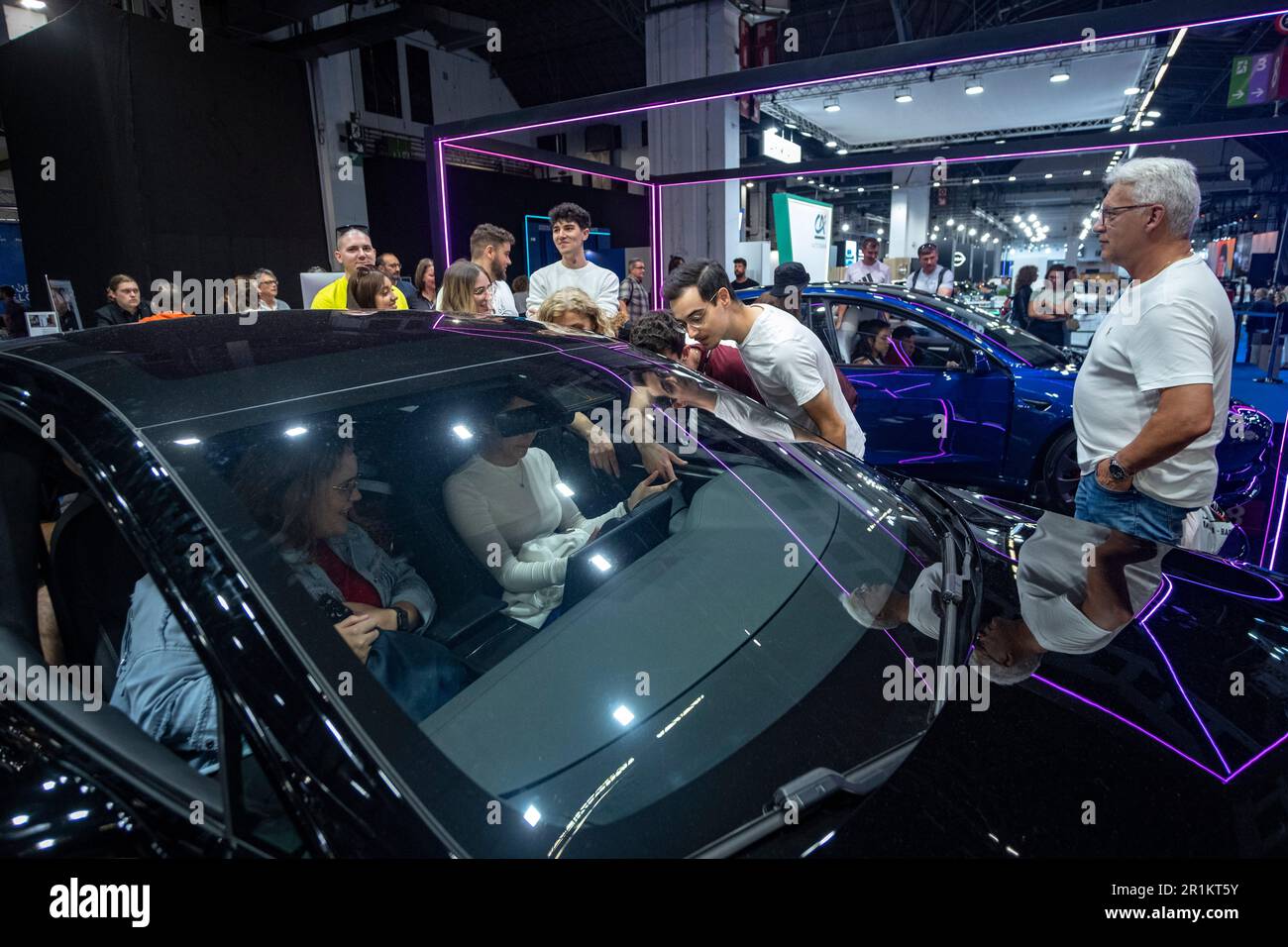 Barcelona, Spain. 14th May, 2023. The Tesla space is seen with great public attendance at the Automobile Barcelona show. The Automobile Barcelona 2023 show opens its doors from May 13 to 21 at the Montjüic fairgrounds. 23 car brands will present their novelties highlighting the electric car as the protagonist. (Photo by Paco Freire/SOPA Images/Sipa USA) Credit: Sipa USA/Alamy Live News Stock Photo