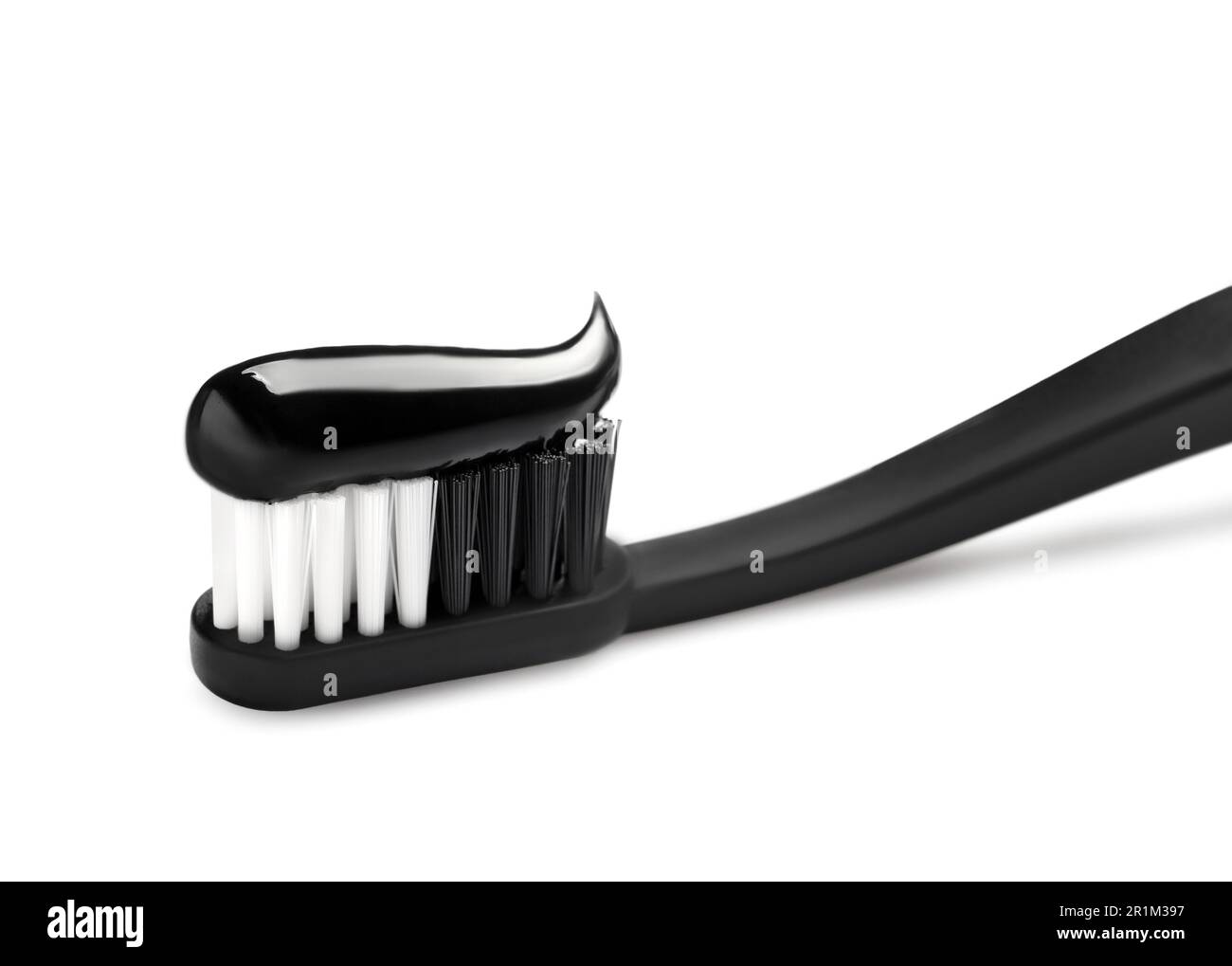 Brush with charcoal toothpaste isolated on white Stock Photo Alamy
