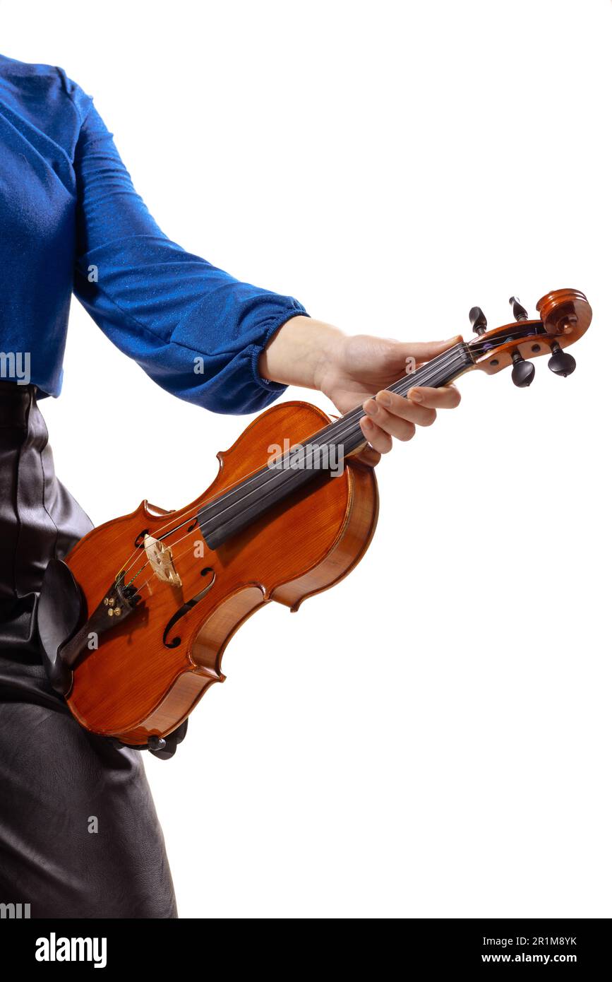 Abstract elegant girl holding a violin. Female violinist isolated on white background. Stock Photo