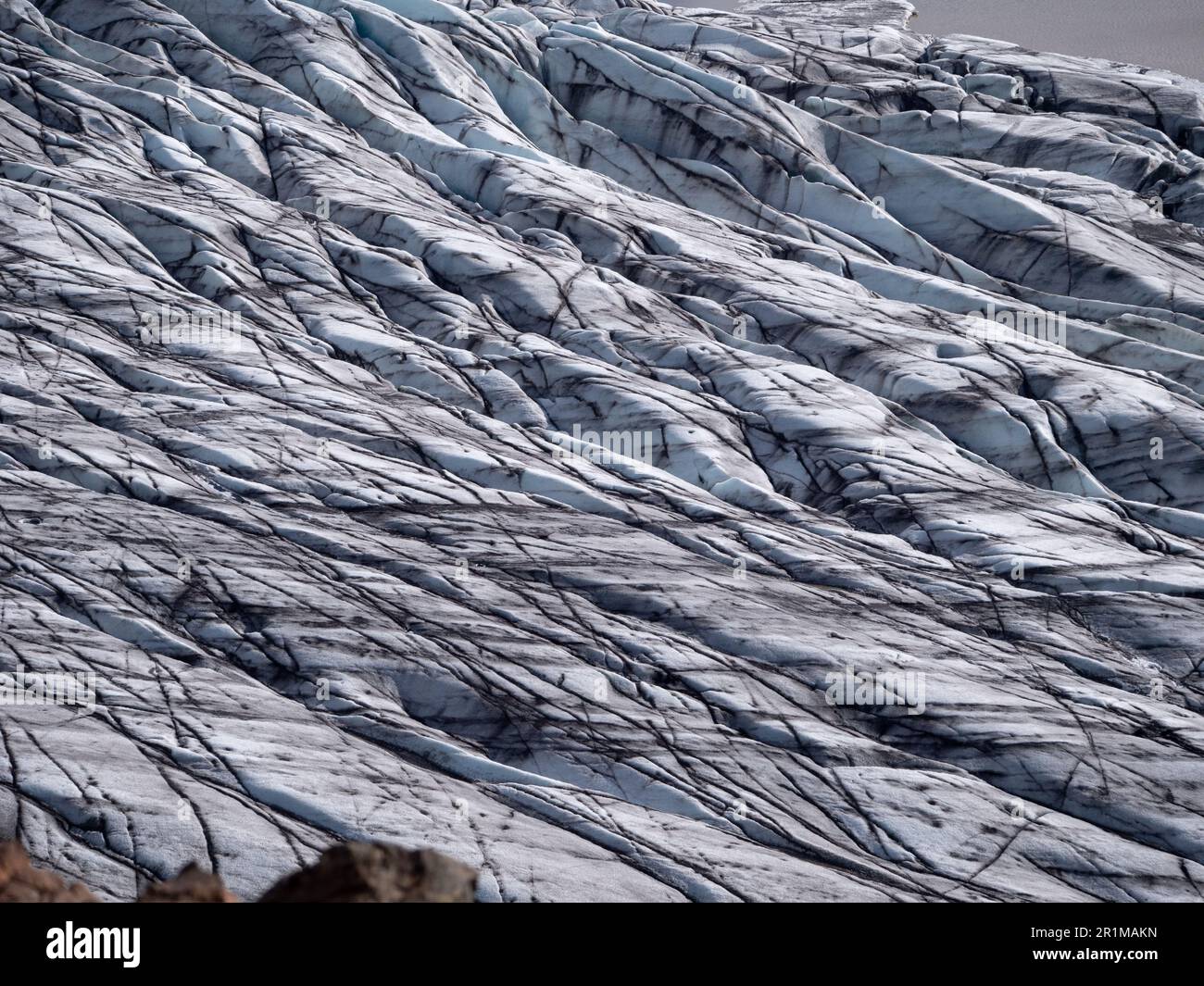 A breathtaking landscape featuring snow-capped mountains and a glacier ...