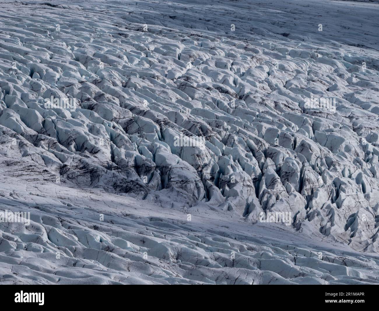 View of A breathtaking landscape featuring snow-capped mountains and a glacier ...