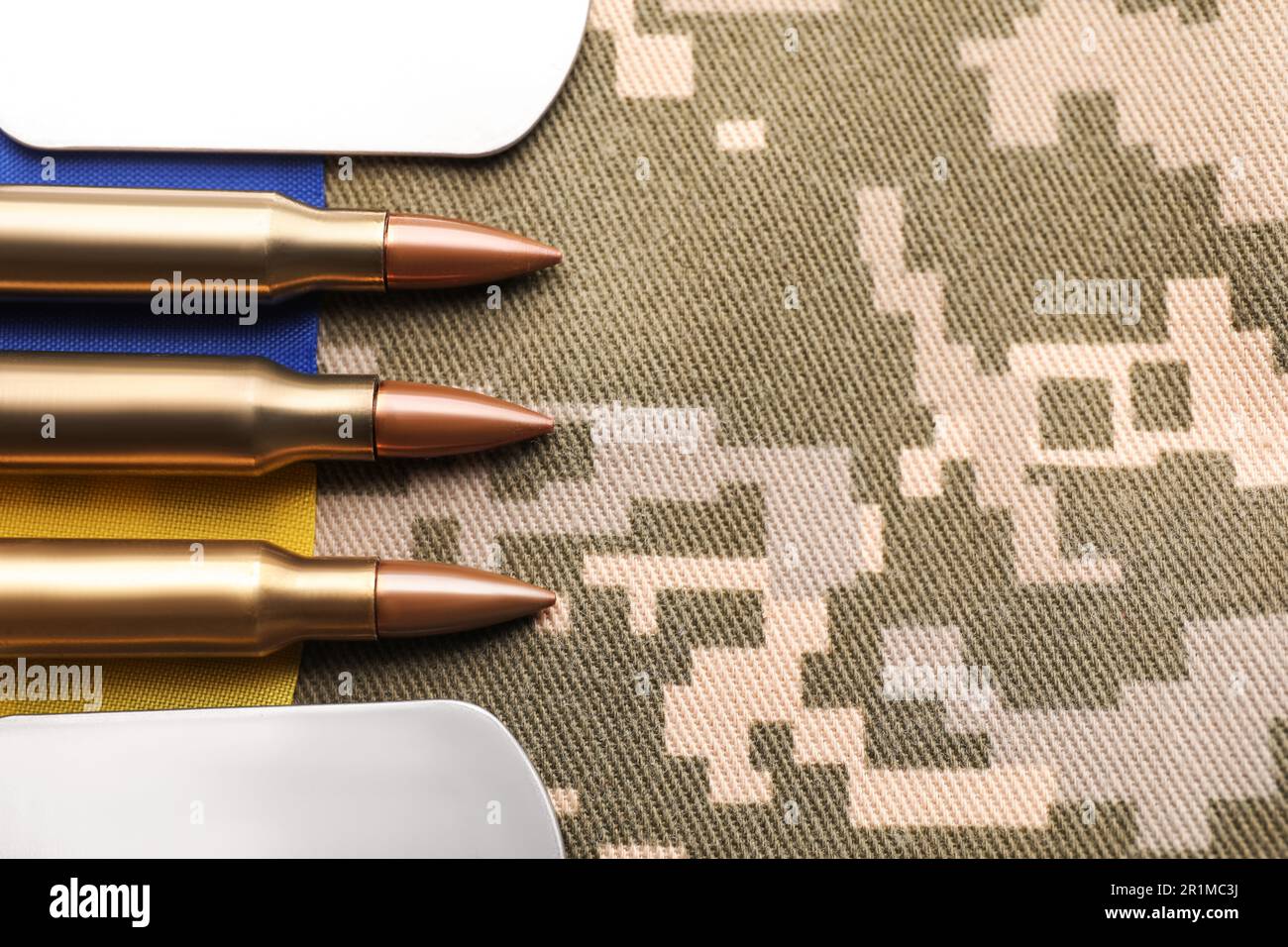 Military ID tags, bullets and Ukrainian flag on pixel camouflage, flat ...