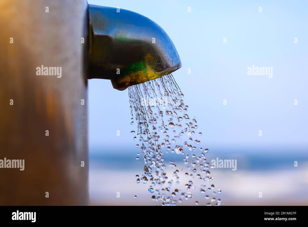 Running water from the tap . Running water drops Stock Photo Alamy