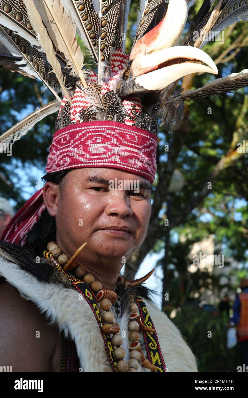 Dayak Chief with a Hornbill Headdress at a parade in Kuching, Sarawak
