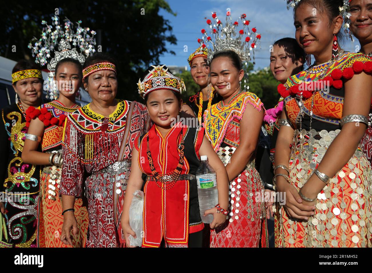 Dayak People from different tribes together at a parade in Kuching, Sarawak, Malaysia, Borneo. Stock Photo