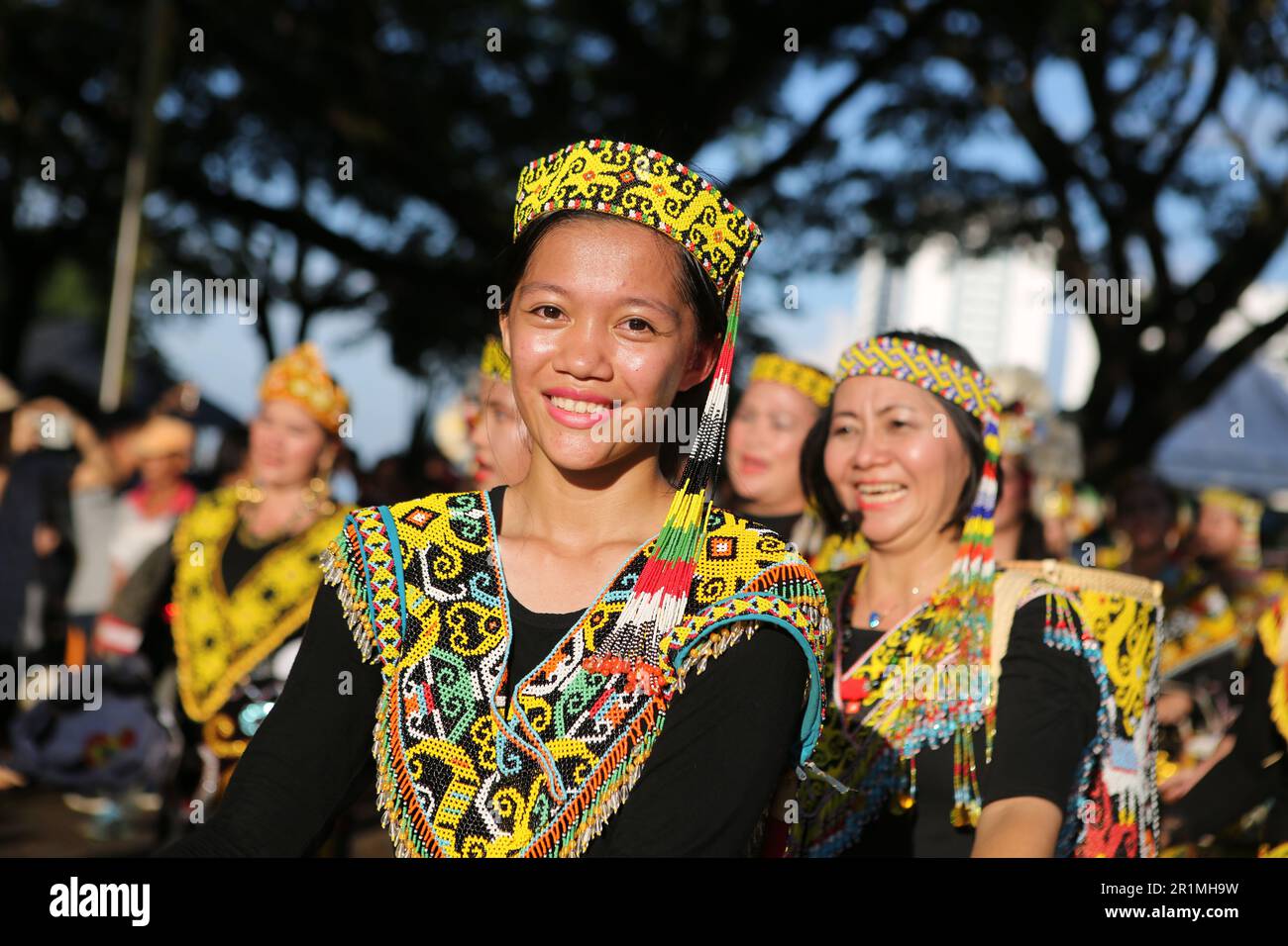 Kayan girls in her beautiful beaded outfit in Kuching, Sarawak, Malaysia, Borneo. Stock Photo