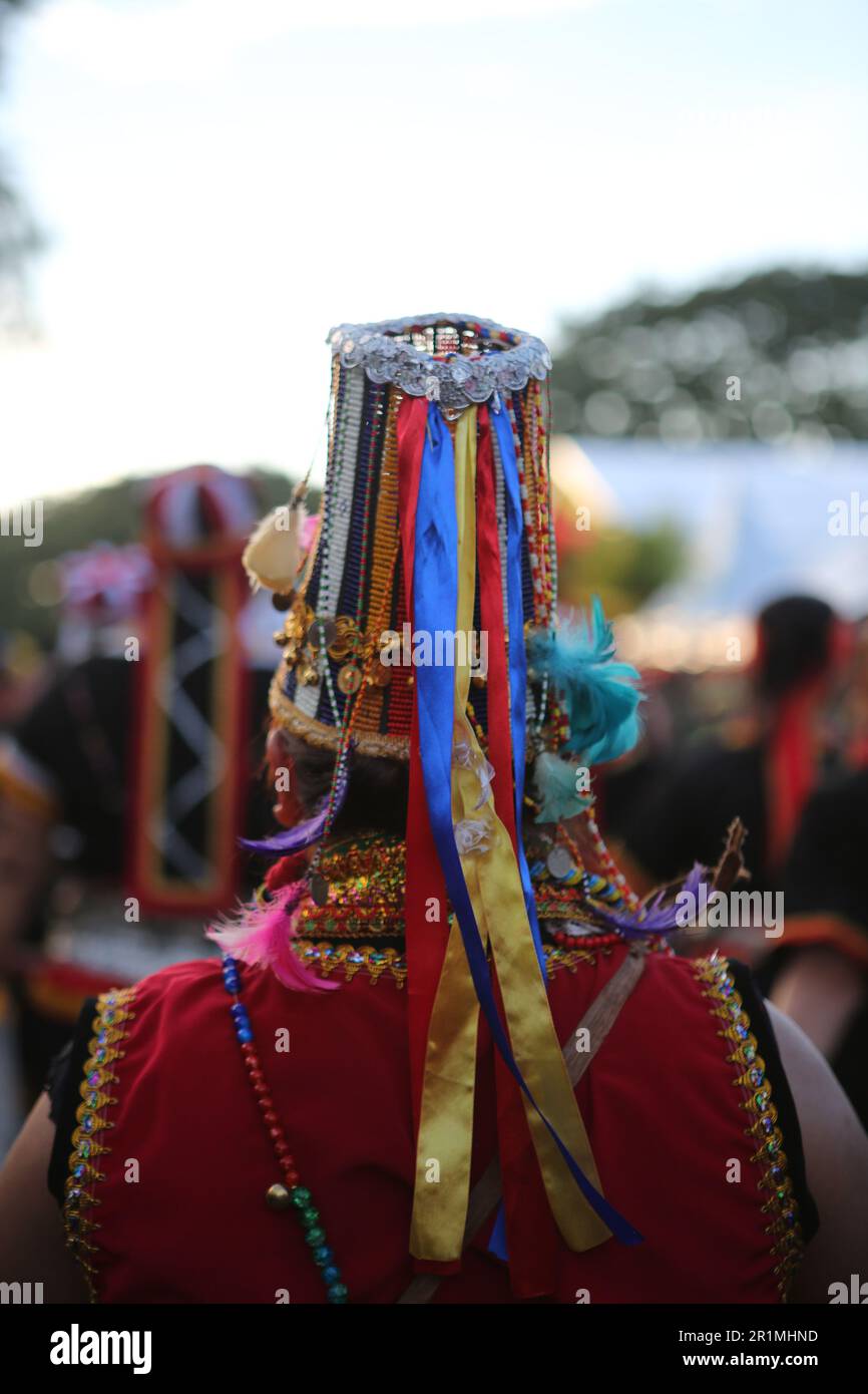Whimsical Tall Head Dress of the Bidayuh People in Kuching, Sarawak, Malaysia, Borneo. Stock Photo
