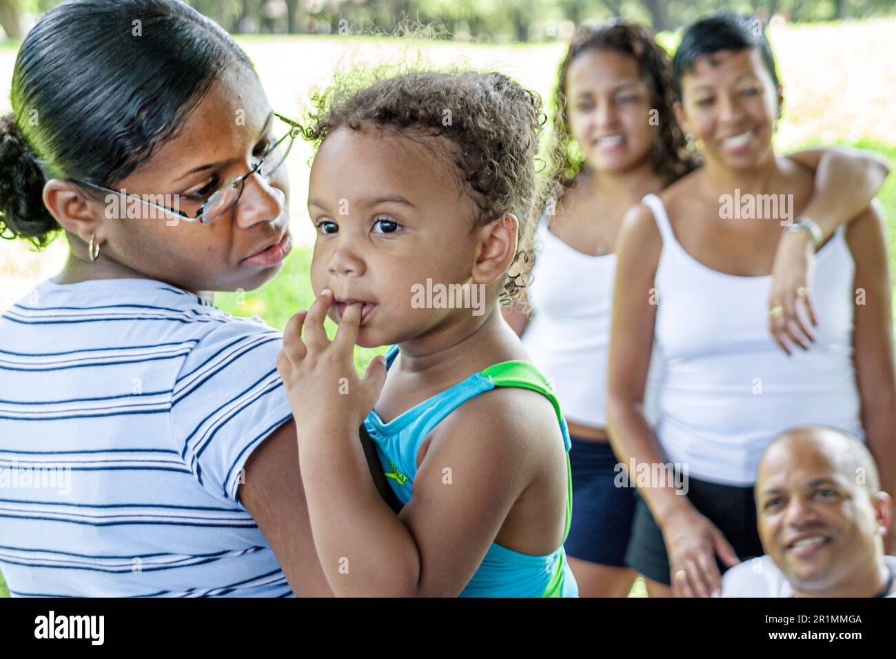 Florida Hollywood Topeekeegee Yugnee Park,family families parent parents child children,mother father woman female man male female,Black African Afric Stock Photo
