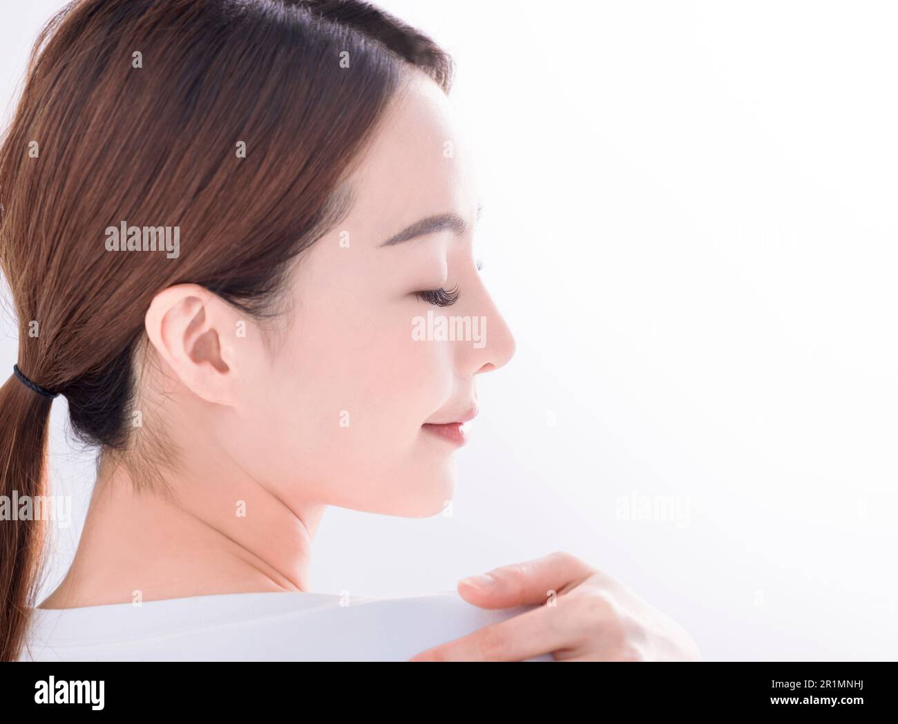 Beautiful young woman with clean fresh skin on white background Stock ...
