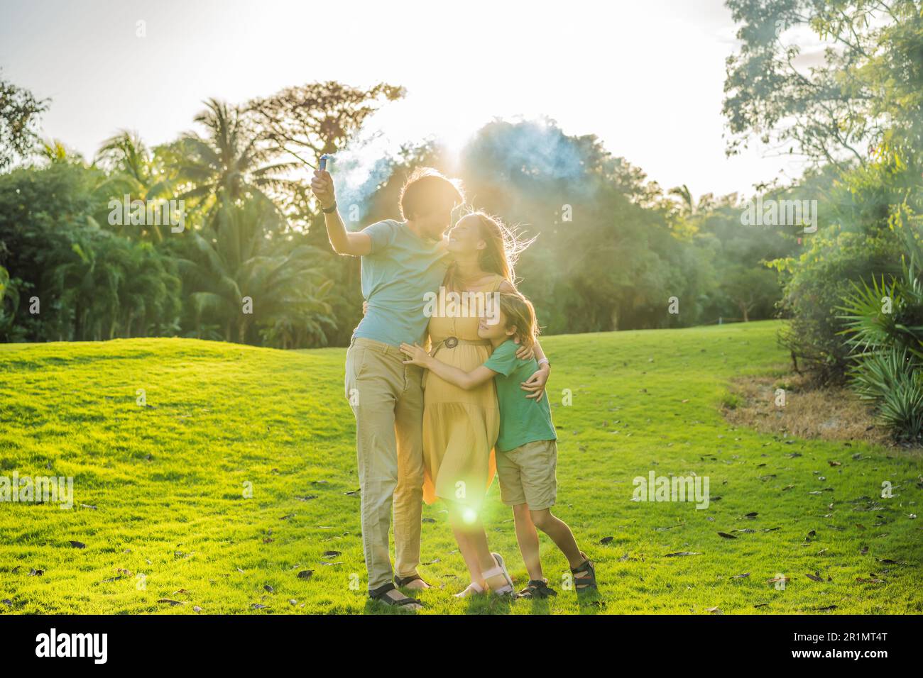 Pregnant mom, dad and son at the gender party on the golf course ...
