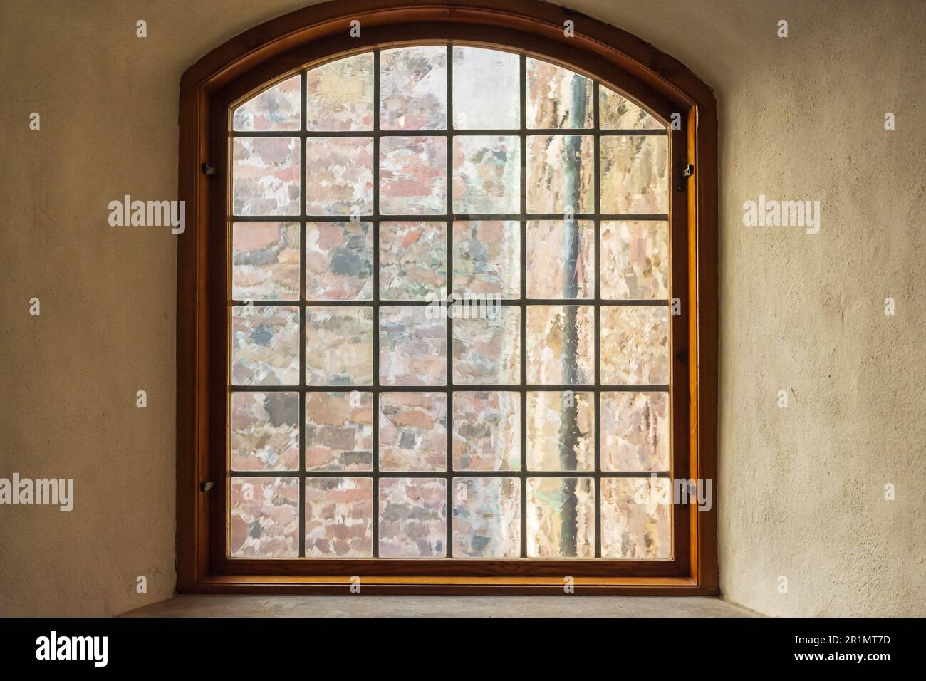 Glass windows made of old uneven crown glass in medieval Turku castle