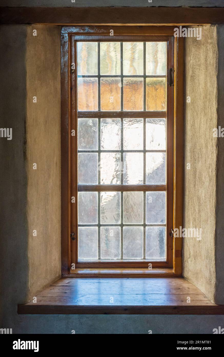 Glass windows made of old uneven crown glass in medieval Turku castle
