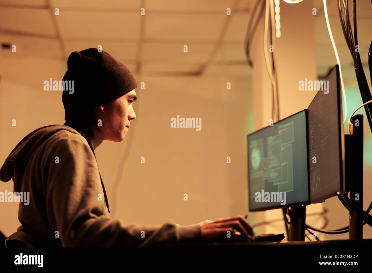 Asian man computer hacker hi-res stock photography and images - Alamy