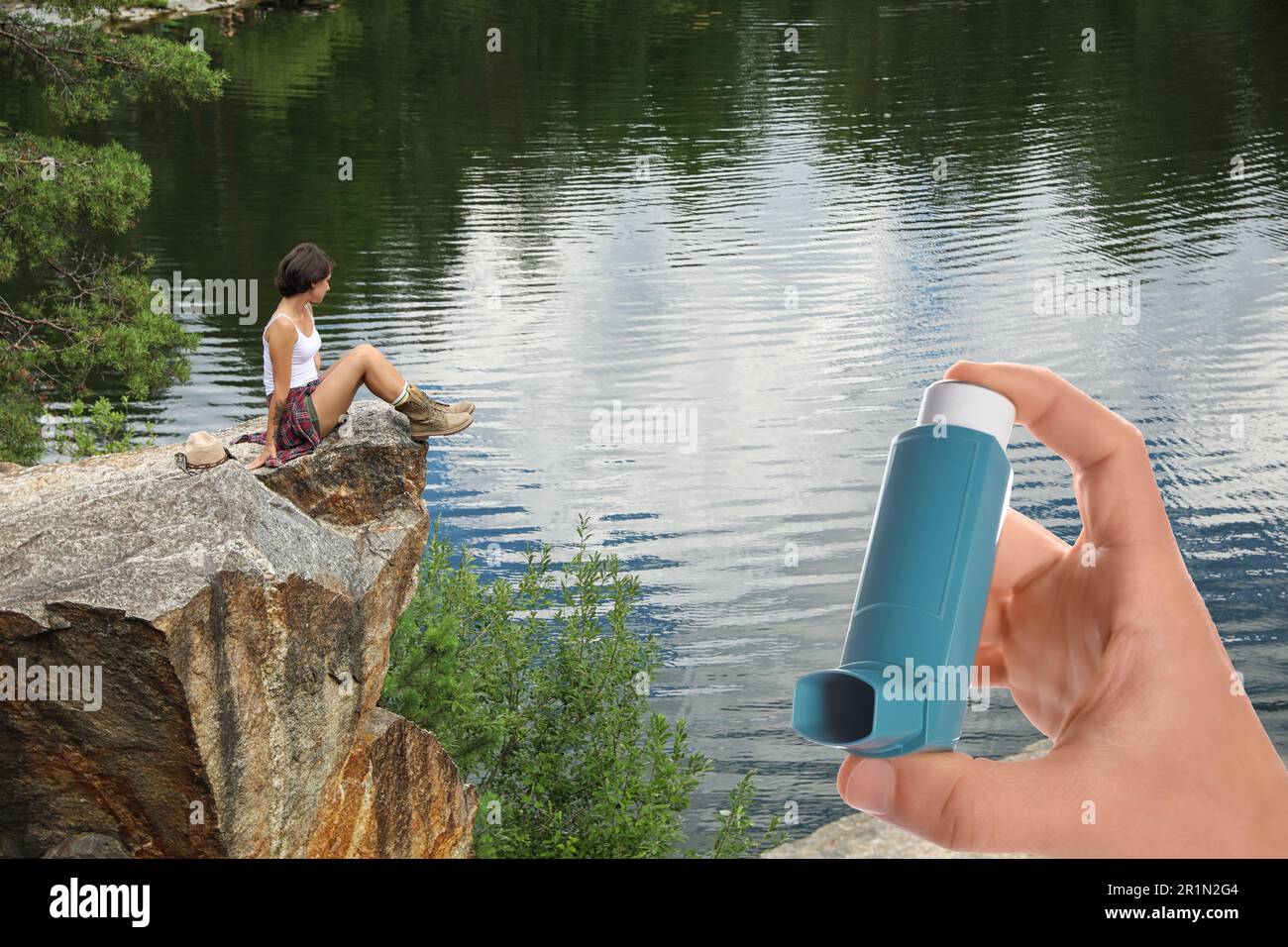 Man with asthma inhaler near lake, closeup. Emergency first aid during outdoor recreation Stock Photo
