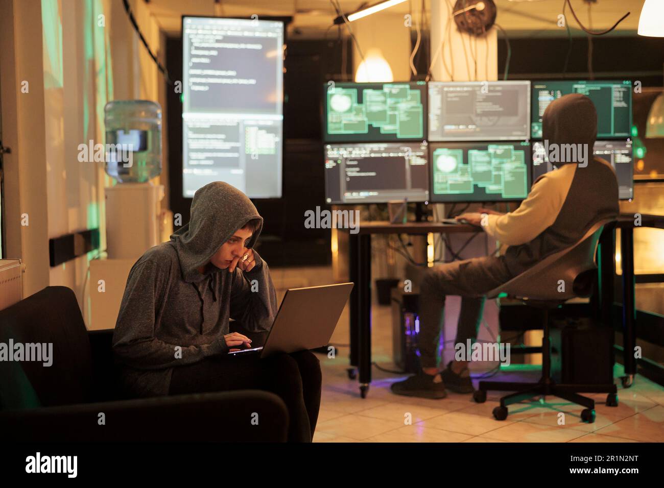 Two hackers working on computers to crack encryption Stock Photo Alamy