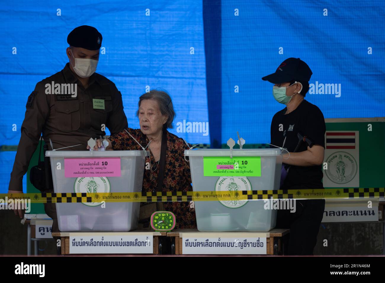 Bangkok, Thailand. 14th May, 2023. A woman casts his ballot during voting for general election at polling station in Bangkok on May 14, 2023. (Photo by Teera Noisakran/Pacific Press) Credit: Pacific Press Media Production Corp./Alamy Live News Stock Photo