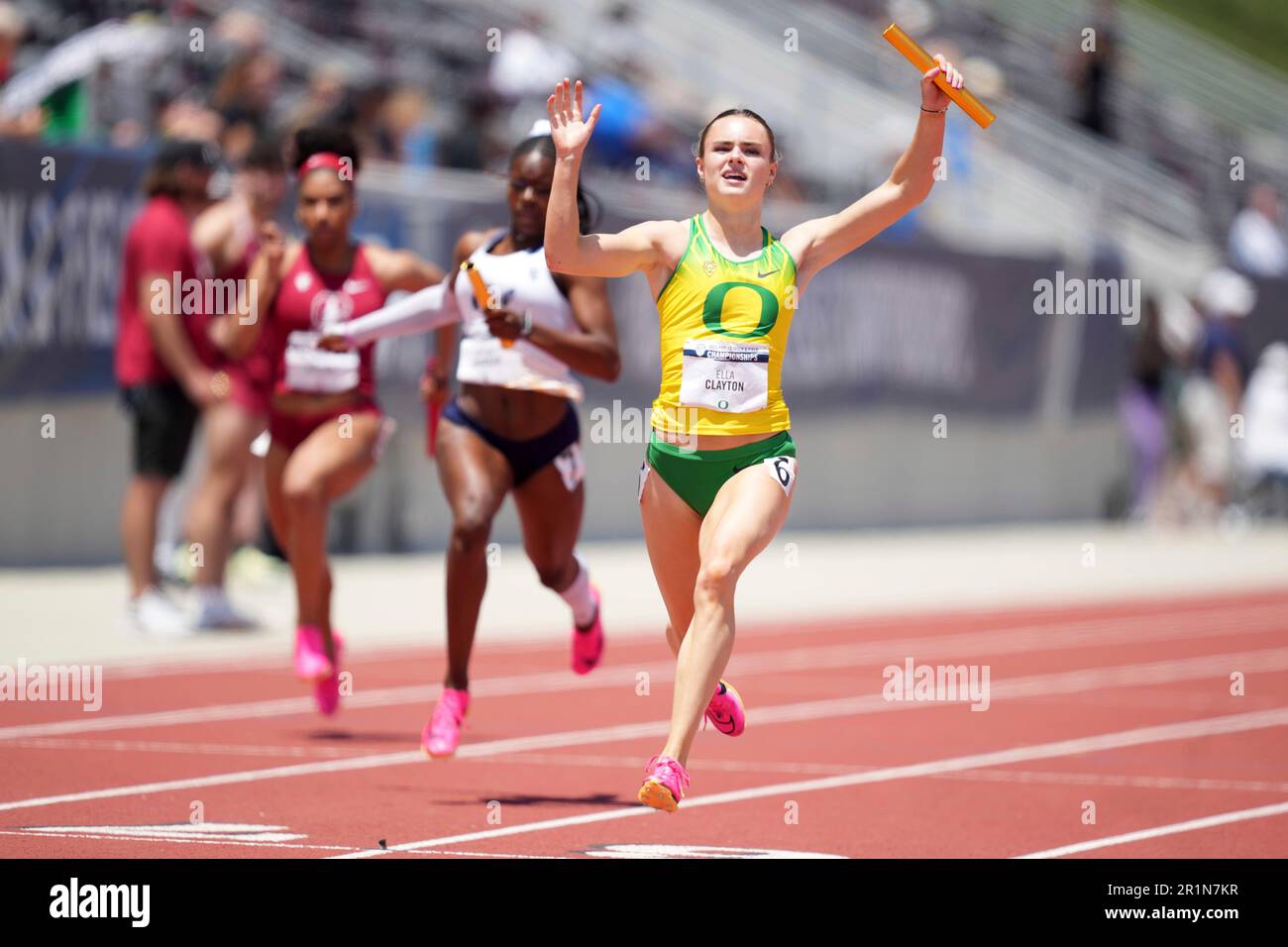 Ella Clayton celebrates after running the anchor leg on the Oregon