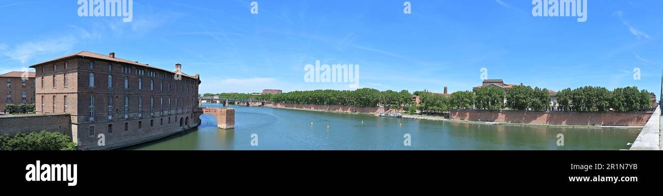 Panorama of Garonne River, Toulouse from Pont Neuf, with Hotel Dieu St Jacques on left and bell tower of Saint Sernin Church in the distance Stock Photo