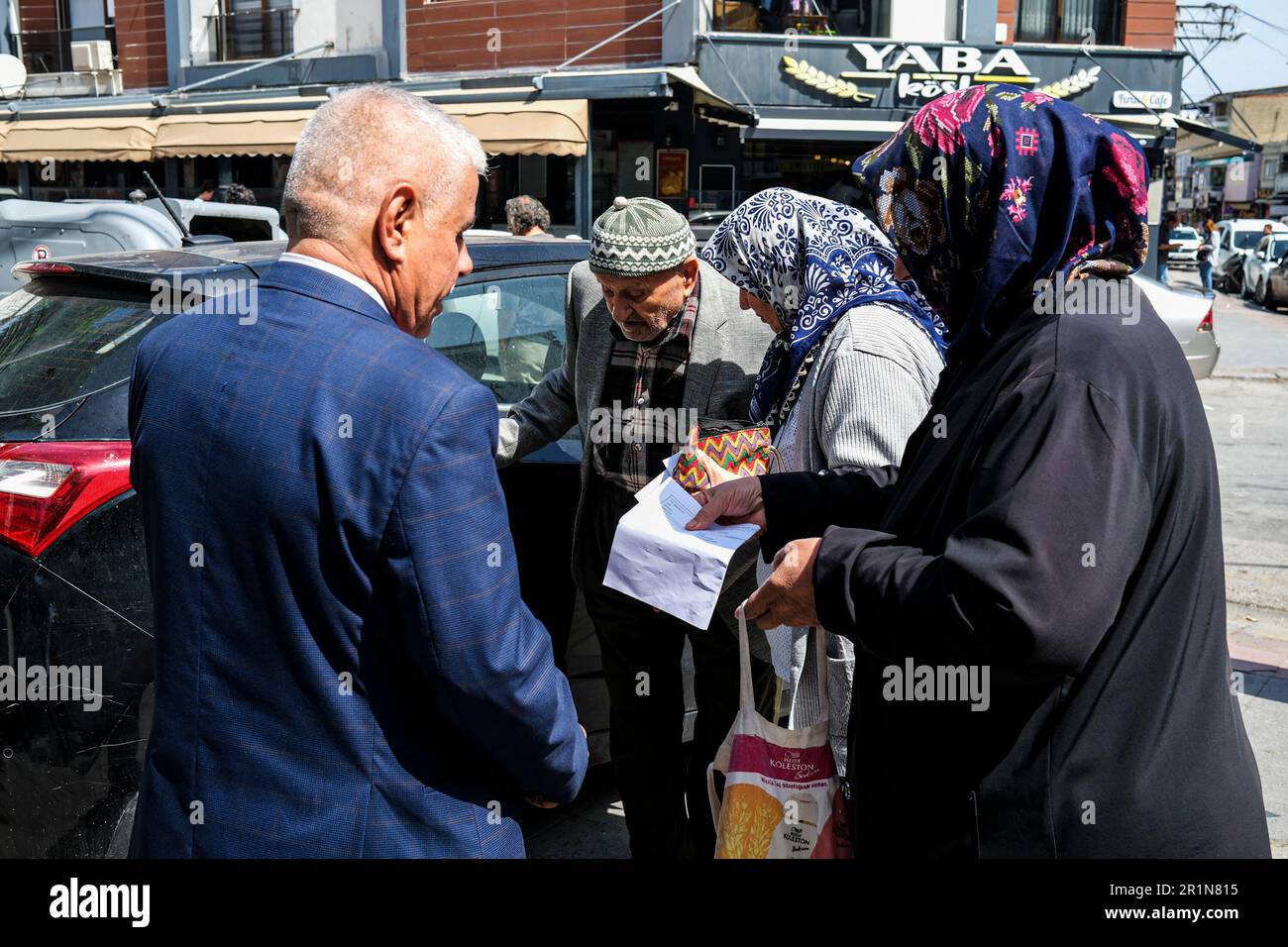 Izmir, Turkey. 14th May, 2023. People are seen going to their precinct to vote during the elections. Turkish voters proceed to their respective precincts to vote for their favored candidates in the 2023 presidential and parliamentary elections in Turkey. It is said that this is the biggest elections in Turkey history. Credit: SOPA Images Limited/Alamy Live News Stock Photo