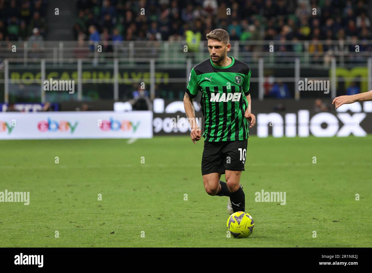 Milan, Italy. 13th May, 2023. Italy, Milan, may 13 2023: Domenico Berardi (Sassuolo striker) dribbles in front court in the second half during soccer game FC INTER vs SASSUOLO, Serie A Tim 2022-2023 day35 San Siro stadium (Photo by Fabrizio Andrea Bertani/Pacific Press) Credit: Pacific Press Media Production Corp./Alamy Live News Stock Photo