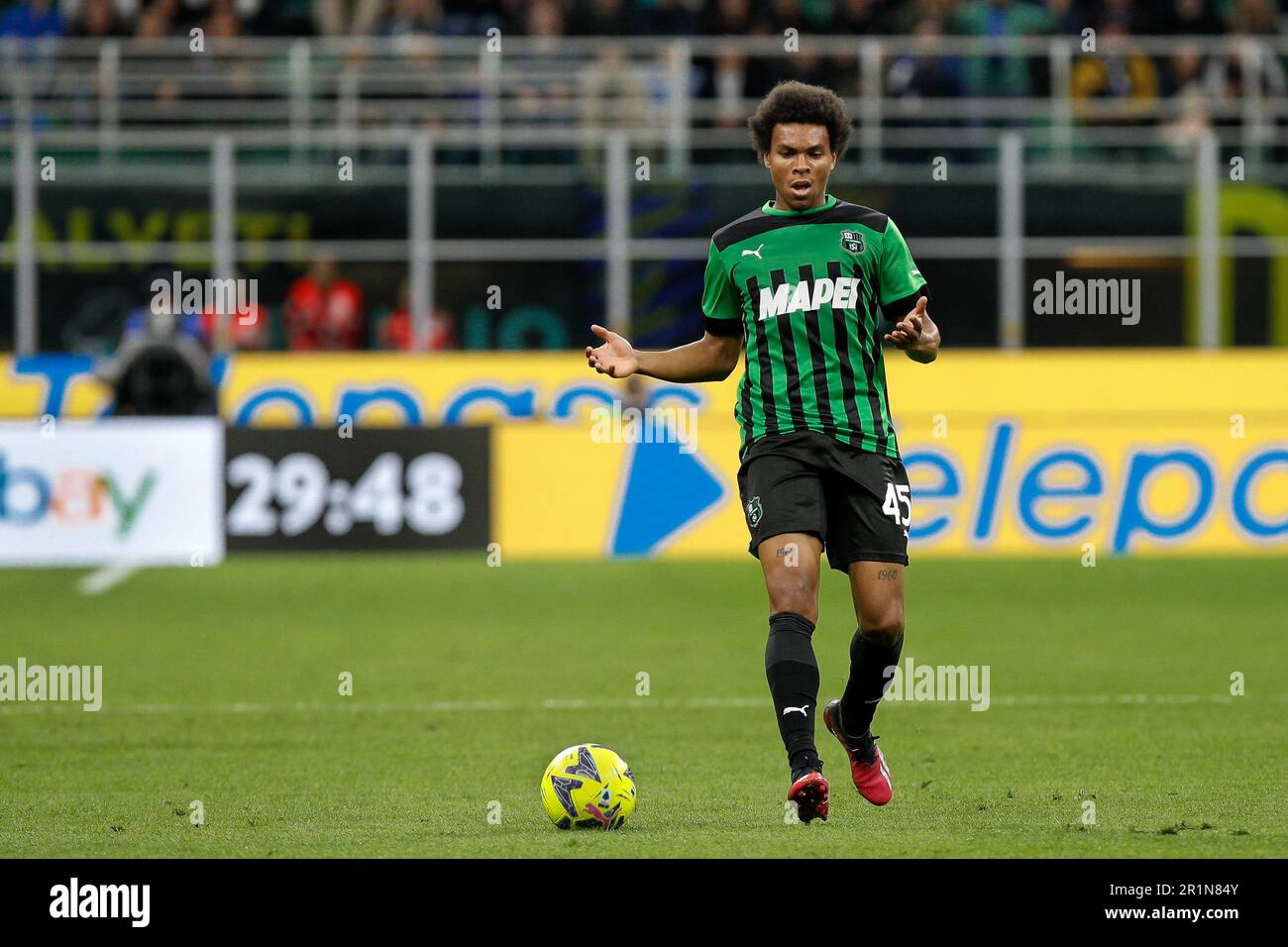 Milan, Italy. 13th May, 2023. Italy, Milan, may 13 2023: Armand Lauriente (Sassuolo striker) dribbles in center field in the first half during soccer game FC INTER vs SASSUOLO, Serie A Tim 2022-2023 day35 San Siro stadium (Photo by Fabrizio Andrea Bertani/Pacific Press) Credit: Pacific Press Media Production Corp./Alamy Live News Stock Photo