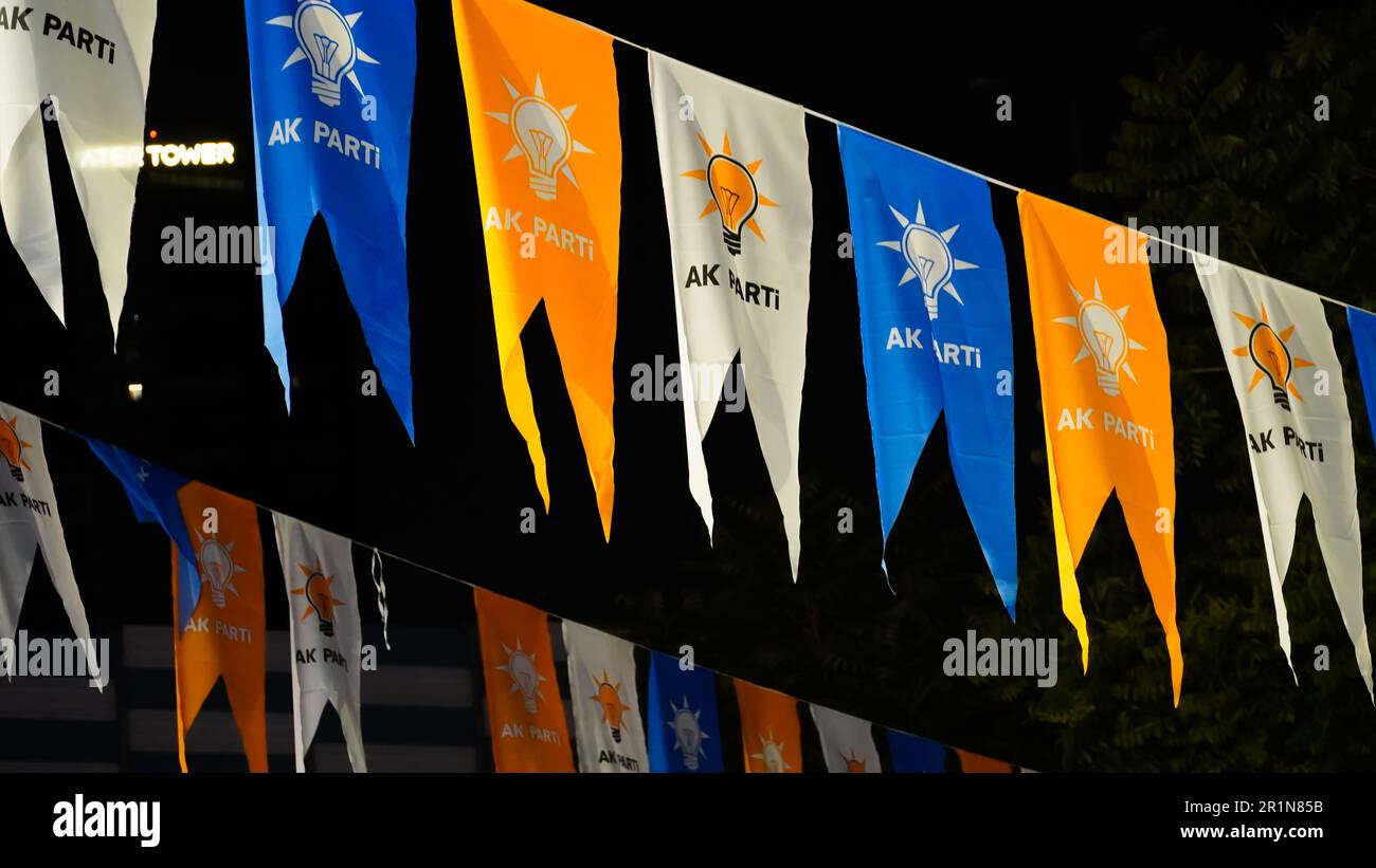 Izmir, Turkey. 15th May, 2023. AK Party supporters are watching live updates of the Turkish 2023 General Elections at midnight in front of the AK Party Izmir Provincial Presidency. Erdogan leads with 49.49% of the vote, Kilicdaroglu takes 44.79% of the vote after 91.93% of ballots were counted, the head of Turkey's Supreme Election Council said in early Monday. (Photo by Idil Toffolo/Pacific Press) Credit: Pacific Press Media Production Corp./Alamy Live News Stock Photo