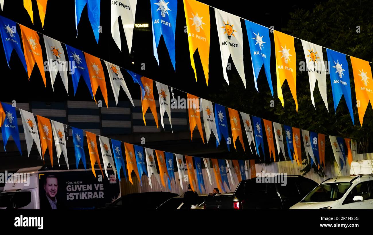 Izmir, Turkey. 15th May, 2023. AK Party supporters are watching live updates of the Turkish 2023 General Elections at midnight in front of the AK Party Izmir Provincial Presidency. Erdogan leads with 49.49% of the vote, Kilicdaroglu takes 44.79% of the vote after 91.93% of ballots were counted, the head of Turkey's Supreme Election Council said in early Monday. (Photo by Idil Toffolo/Pacific Press) Credit: Pacific Press Media Production Corp./Alamy Live News Stock Photo